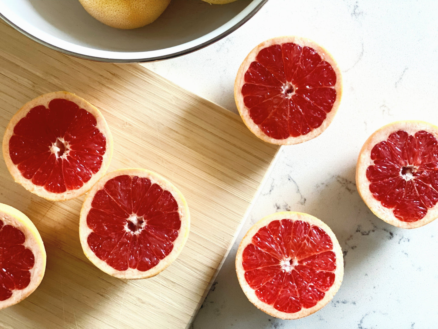 kitchen countertop with grapefruit halves