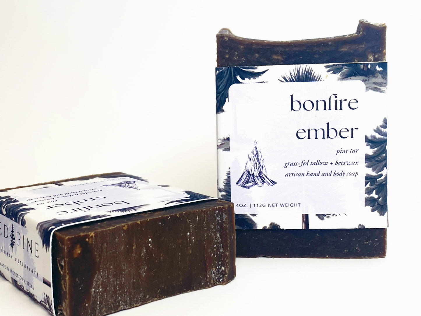 two bars of bonfire ember soap against a white backdrop